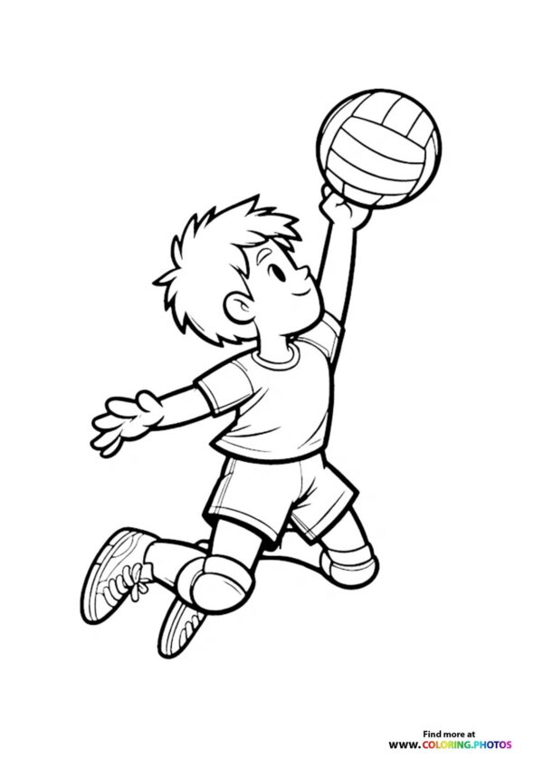 Boy smashing volleyball