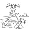Easter bunny on an egg coloring page
