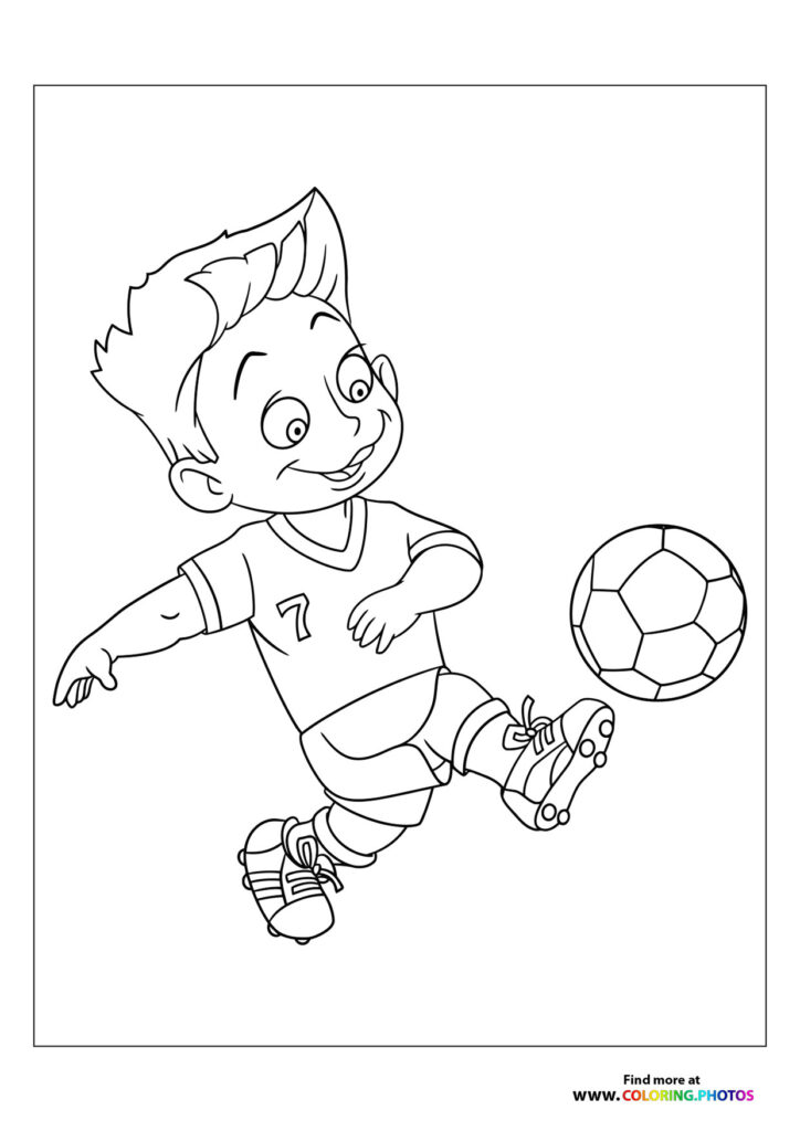 Young Soccer Player Kicking Ball