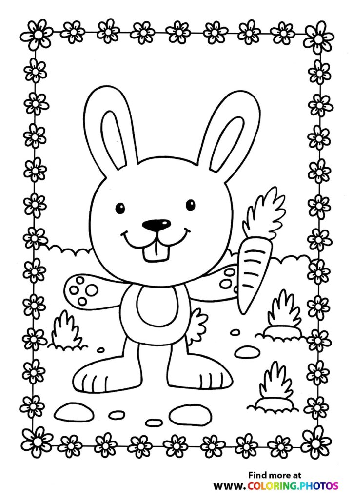 Happy cartoon rabbit holding a carrot with raised paw, surrounded by flowers and bushes coloring page
