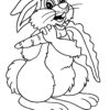 Rabbit eating carrot